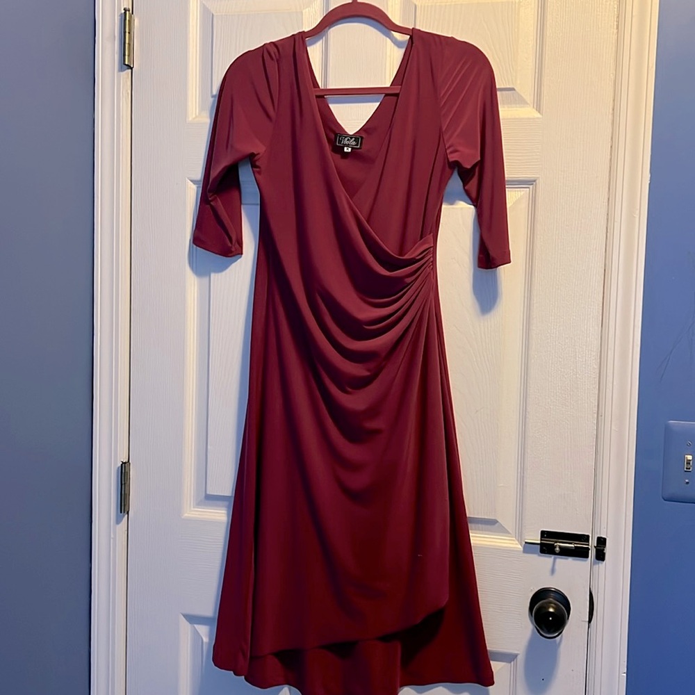 Pink dress. Mid length. 3/4 sleeves. Only worn once.